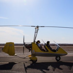 Flying On a Gyrocopter Around Al Khor – Desert safaris Kanwal Malik Official a poet, novelist and a writer based in dubai